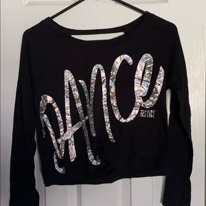 cropped Dance shirt with long sleeves.